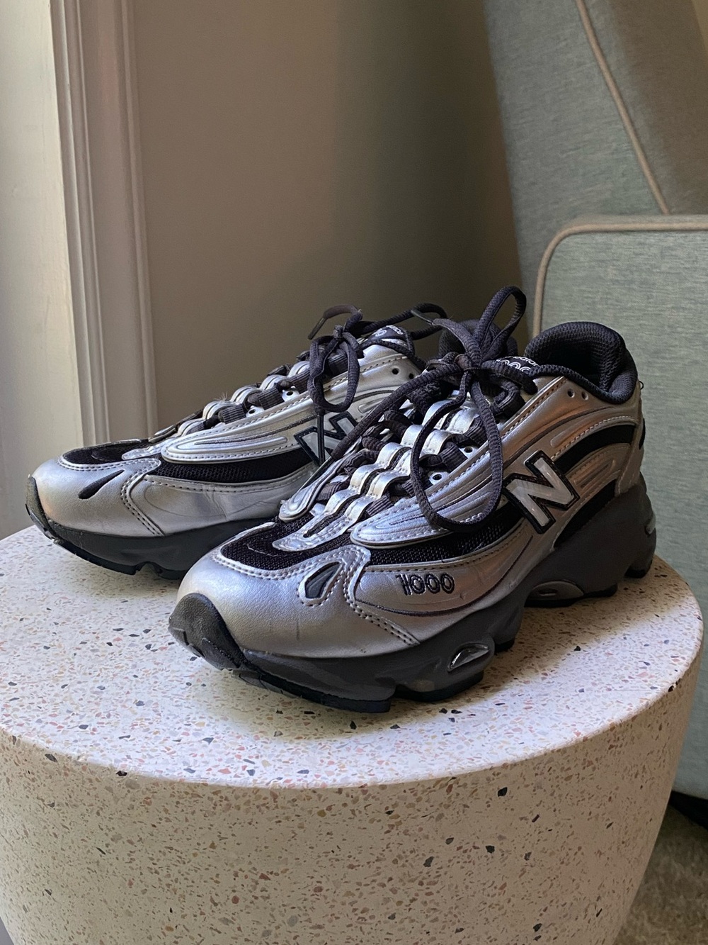 New Balance 1000 in Silver Metallic Black - Women’s 7/Men’s 5.5